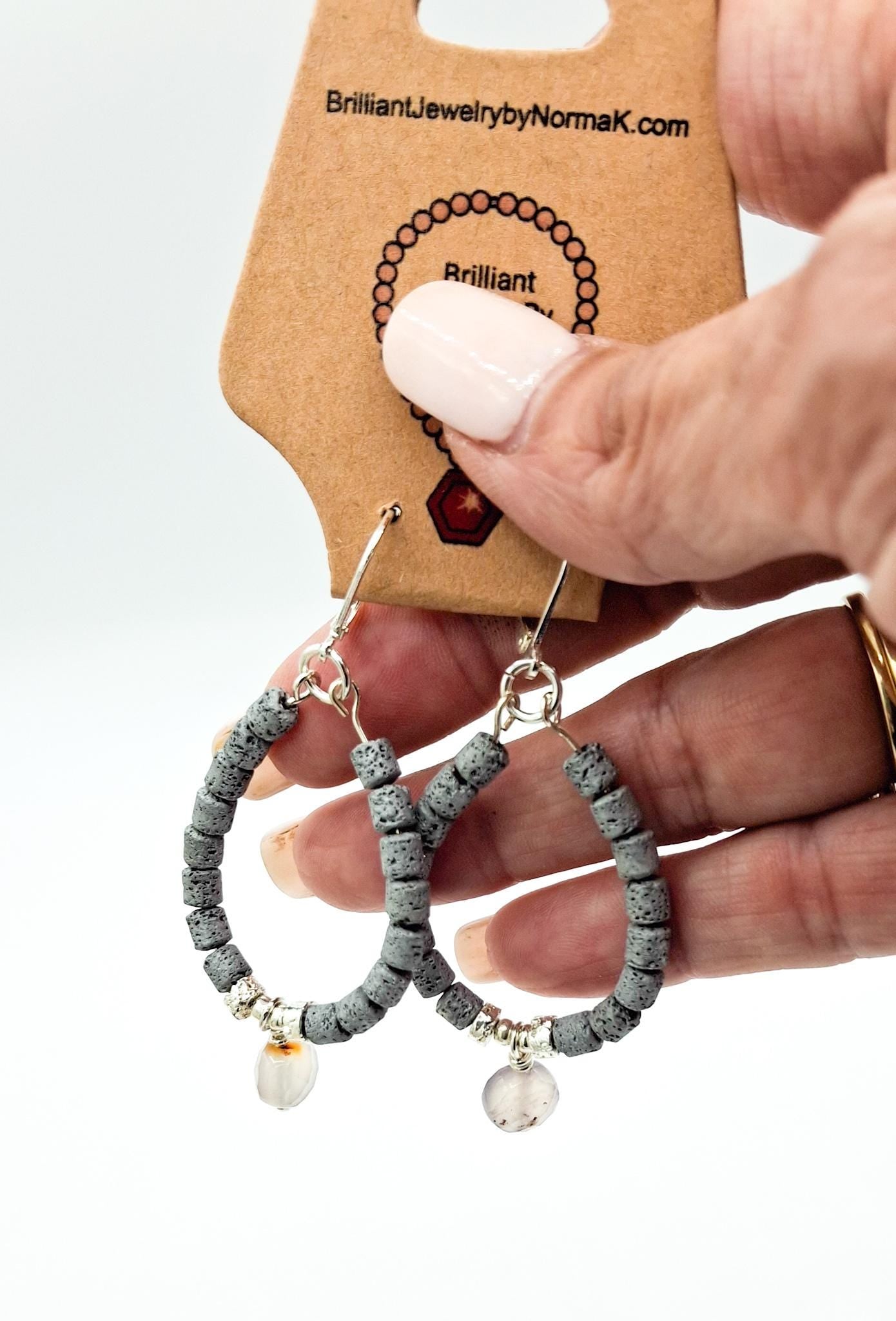 Nk Grey colored plated Hematite hoop earrings with a faceted Agate drop