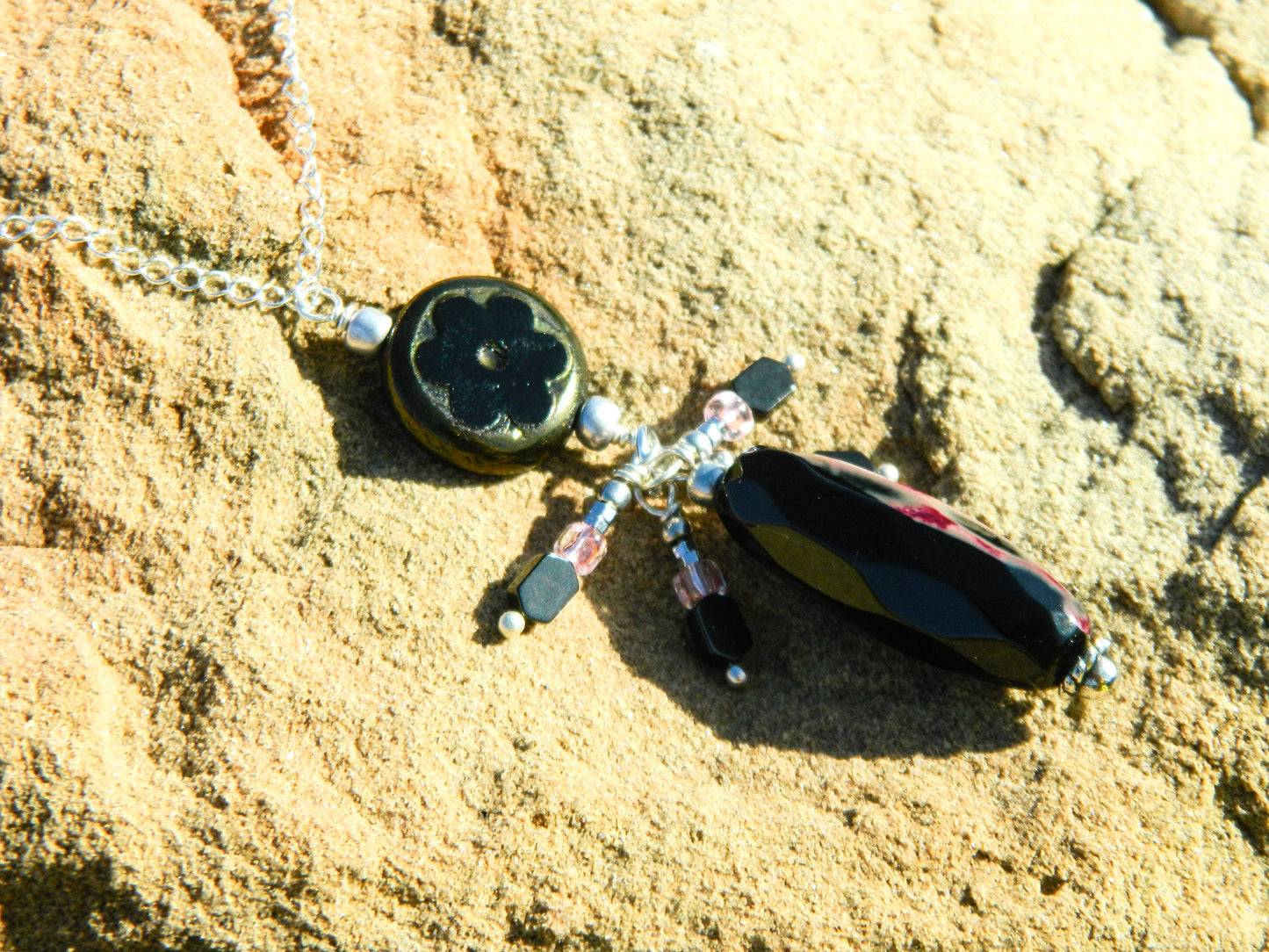 Necklace NK Jet Black Czech Pendant with a Faceted Jet Black tubular gemstone and accent drops surrounded on pendant on a Sterling Silver Chain
