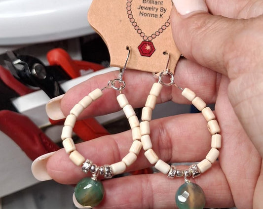 Nk Creme colored plated Hematite hoop earrings with a faceted Green Agate drop