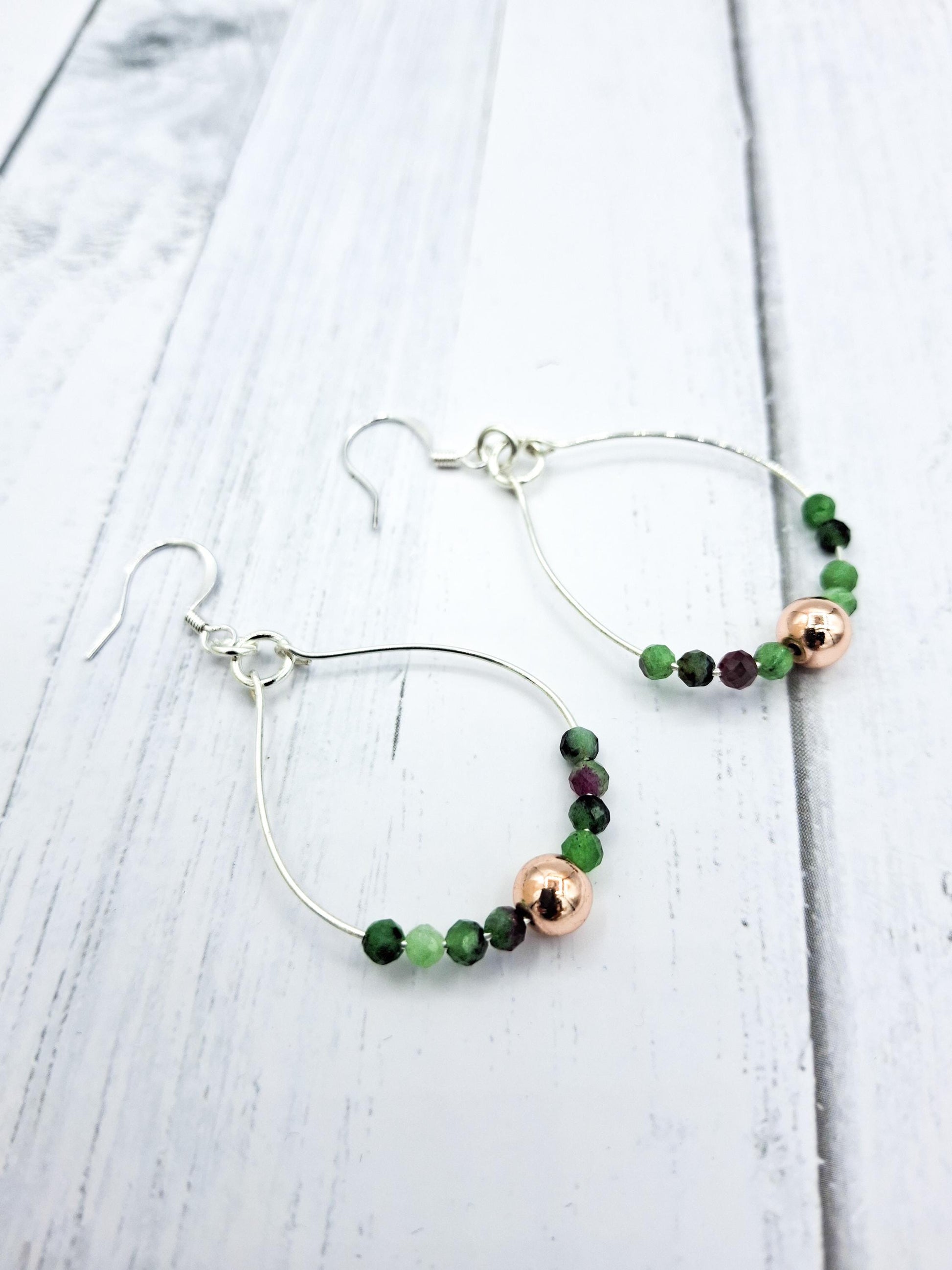 Nk Silver Hoop Earrings, faceted tourmaline beads, with a single copper colored bead
