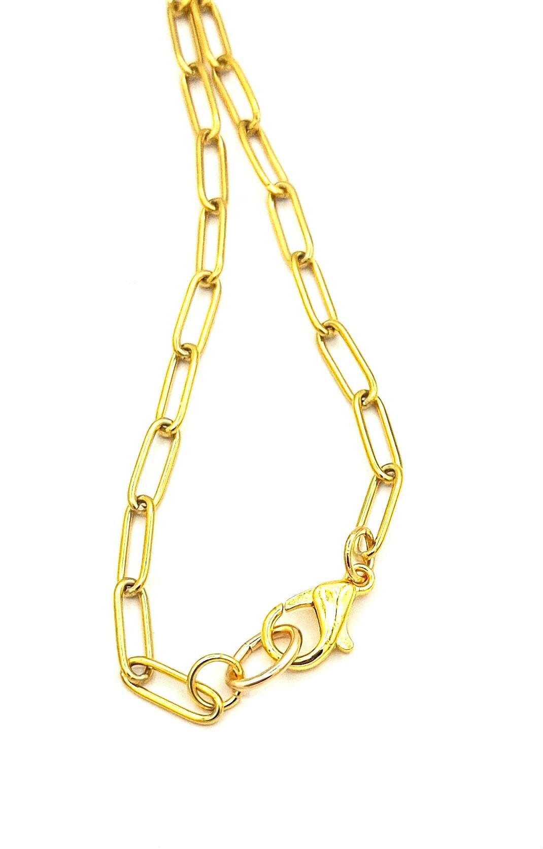 Heart Pendant Necklace: Gold plated Clasp, Paper Clip Chain, with a large rose quartz heart